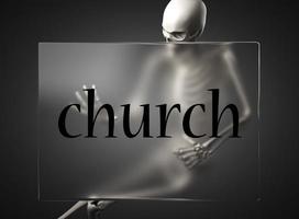 palabra de la iglesia sobre vidrio y esqueleto foto