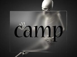 camp word on glass and skeleton photo