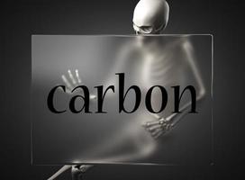 carbon word on glass and skeleton photo