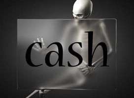 cash word on glass and skeleton photo