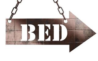 bed word on metal pointer photo