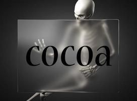 cocoa word on glass and skeleton photo