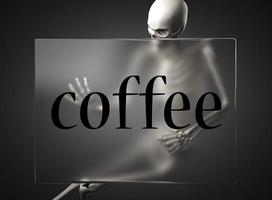 palabra de café en vidrio y esqueleto foto
