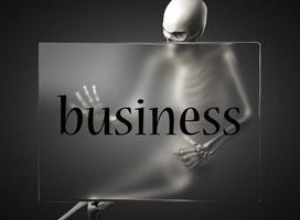 palabra de negocios en vidrio y esqueleto foto