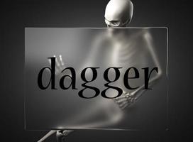 dagger word on glass and skeleton photo