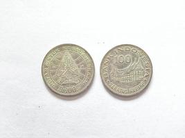 100 Rupiah.  Indonesian old money scattered in the 70s.  Suitable for content related to finance and investment. photo