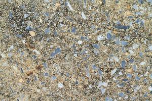 Stone cement-mixed surface, old and dirty. photo