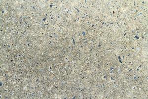 Stone cement-mixed surface, old and dirty. photo