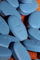 Blue medical pills close up background high quality big size print photo