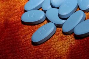 Blue medical pills close up background high quality big size print photo