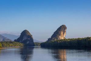 Beautiful natural view of Khao Khanab Nam mountain at Krabi River, Krabi, Thailand. photo