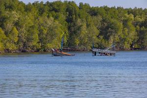 sunken fishing boat at Krabi River, Krabi, Thailand. photo