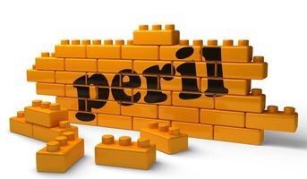 peril word on yellow brick wall photo