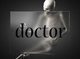 doctor palabra sobre vidrio y esqueleto foto