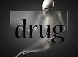 drug word on glass and skeleton photo