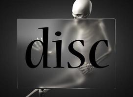 disc word on glass and skeleton photo