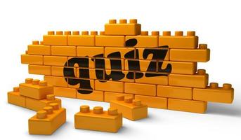 quiz word on yellow brick wall photo