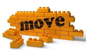 move word on yellow brick wall photo