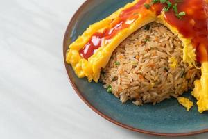 Flavored Fried Rice in an Omelet Wrapping photo