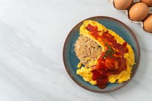 Flavored Fried Rice in an Omelet Wrapping photo