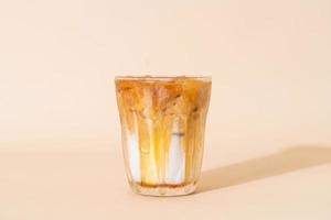 caramel macchiato coffee in glass photo