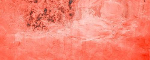 Abstract grunge red colored concrete wall texture pattern background. Long website header or banner format. photo