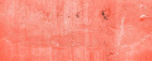 Abstract grunge red colored concrete wall texture pattern background. Long website header or banner format. photo