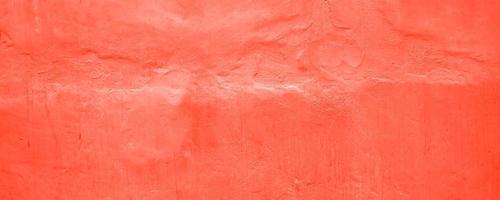 Abstract grunge red colored concrete wall texture pattern background. Long website header or banner format. photo