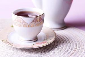 pouring green tea at early morning photo