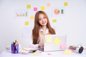 Young Asian businesswoman working concept photo