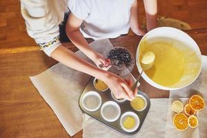 Making muffins and molding in molds photo