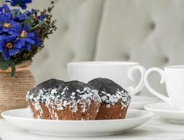 cake and cup of coffee on the table photo