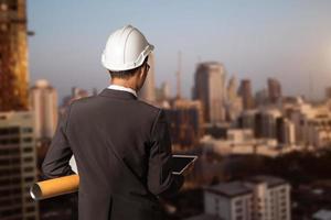 engineer with Creative architect projecting photo