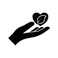 icono de mano con corazón y hoja. estilo de glifo. silueta. adecuado para el icono de la ecología. diseño simple editable. vector de plantilla de diseño