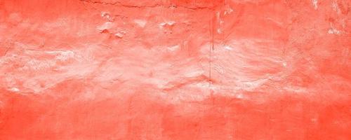 Abstract grunge red colored concrete wall texture pattern background. Long website header or banner format. photo