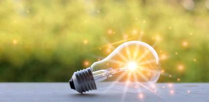 Light bulb on blurry background nature photo