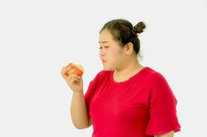 Asian obese women are overweight. With various emotions for herself, eating and exercise photo