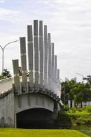 Bekasi, West Java, Indonesia, March 5th 2022. The summarecon bridge with twisted rods art style photo