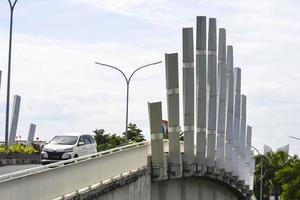 Bekasi, West Java, Indonesia, March 5th 2022. The summarecon bridge with twisted rods art style photo