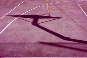 street basket silhouette on the pink court photo