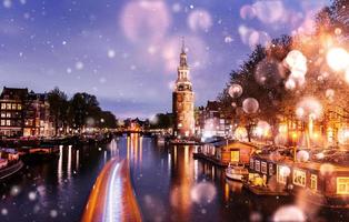 Beautiful night in Amsterdam.  illumination of buildings photo