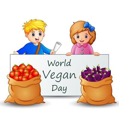World Vegan Day text on sign with kids and vegetables