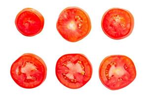 Tomato slice isolated over white background photo