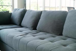 close up empty grey fabric sofa photo