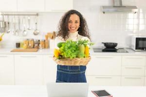 portrait Latin woman in kitchen photo