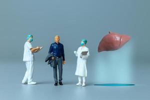 Doctor studying and treating human Liver , World Health Day concept photo