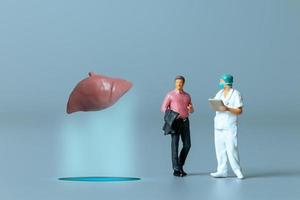 Doctor studying and treating human Liver , World Health Day concept photo