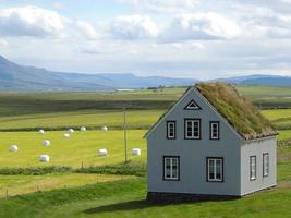 Typical vintage Scandinavian farm house summer northern countryside photo