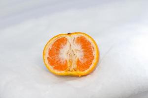 orange slice on white background photo