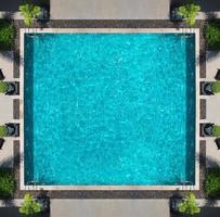 Aerial view images of swimming pool in a sunny day. photo